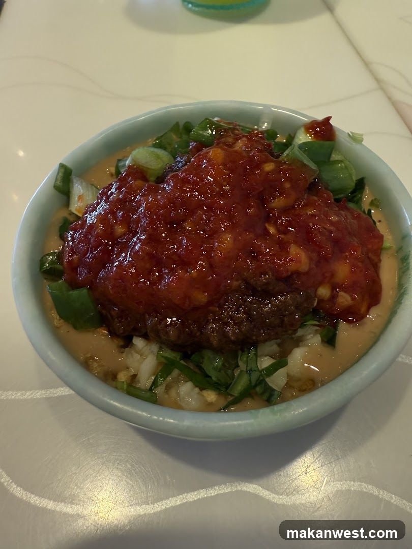 Bowl of Meatball with Sauce and Greens