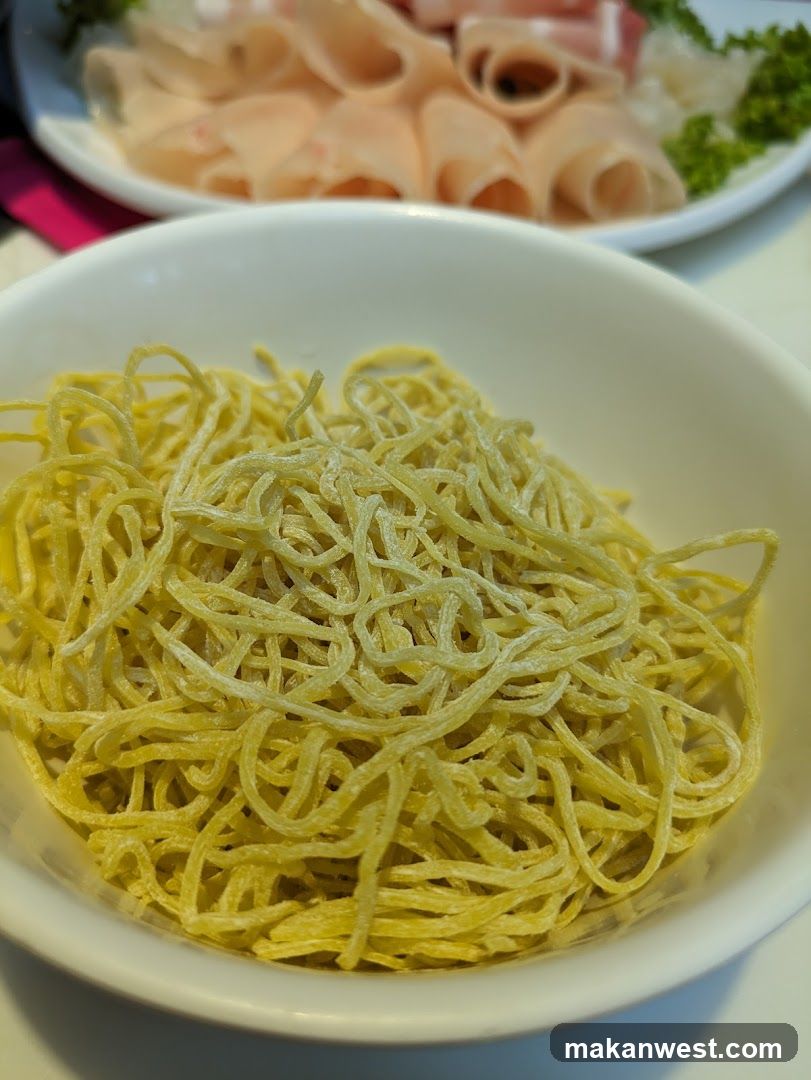 Noodles and Sliced Meat Dish