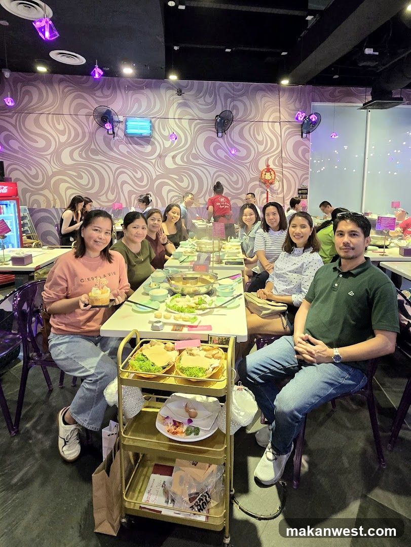 Group dining at a hot pot restaurant