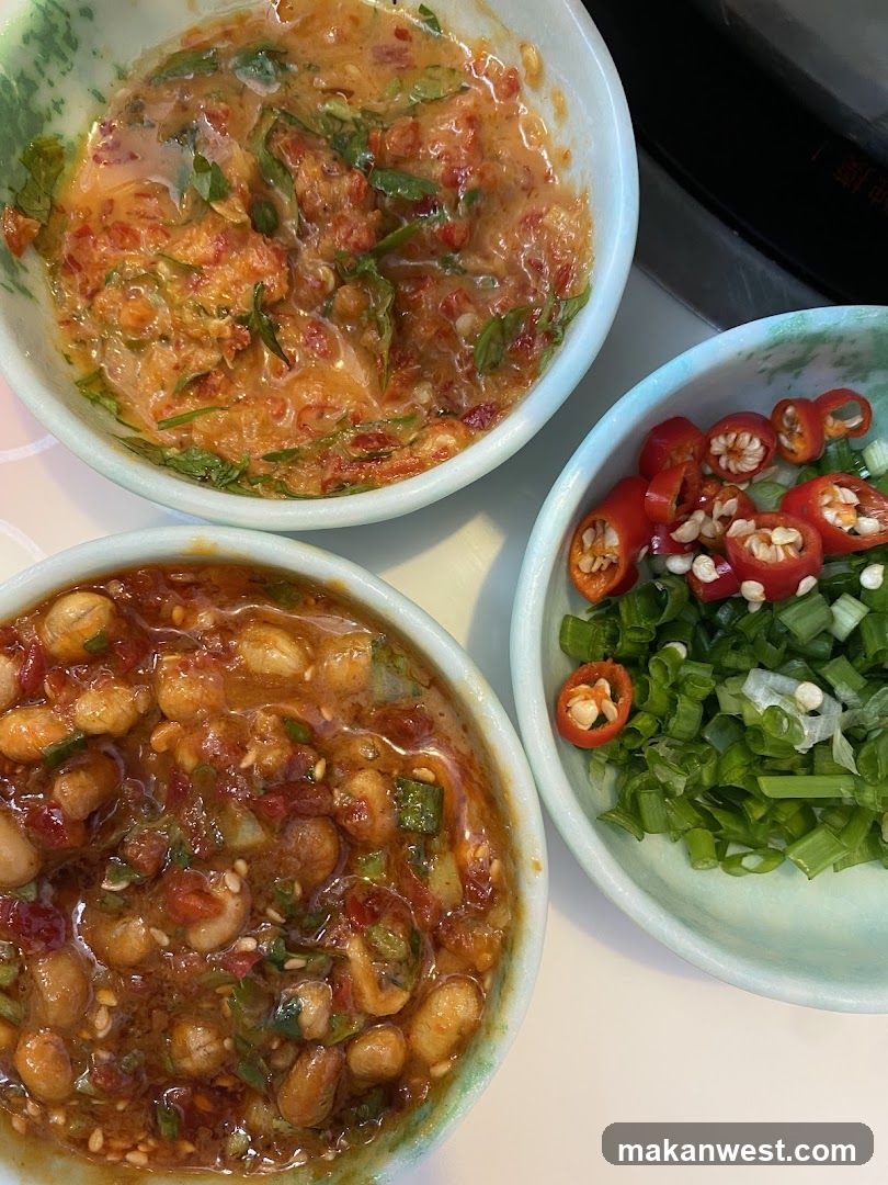Bowl of food with chili and green onions