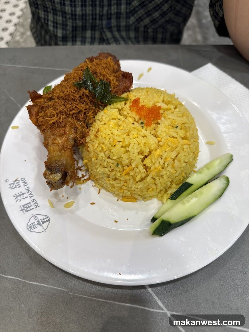 Plate of Fried Rice with Chicken and Cucumber