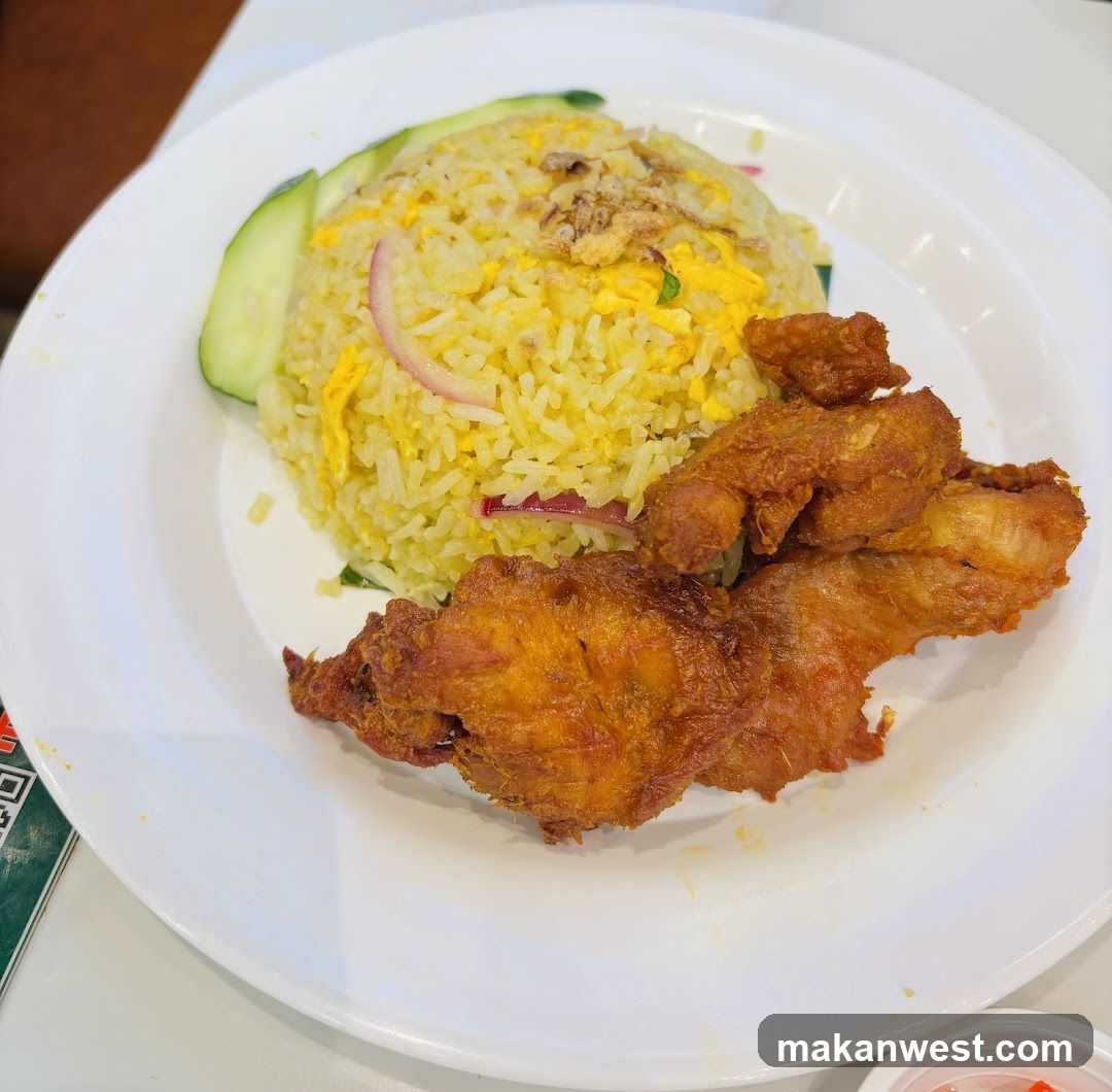 Fried Chicken and Yellow Rice Dish