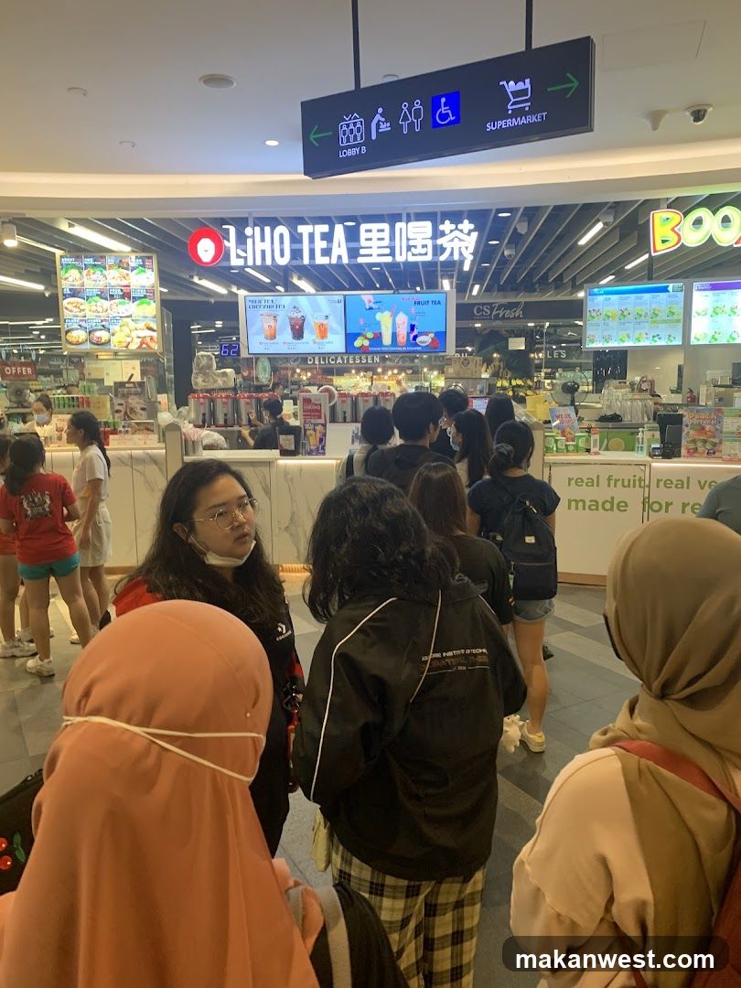 Crowded Mall Interior with LiHo Tea Counter