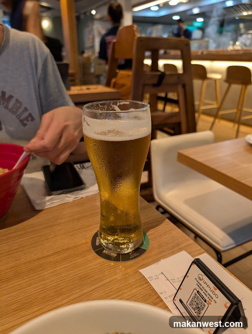 Beer and Food at Restaurant Table