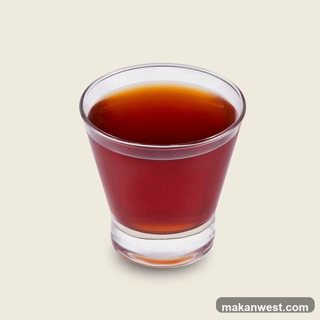 Glass of Dark Liquid
