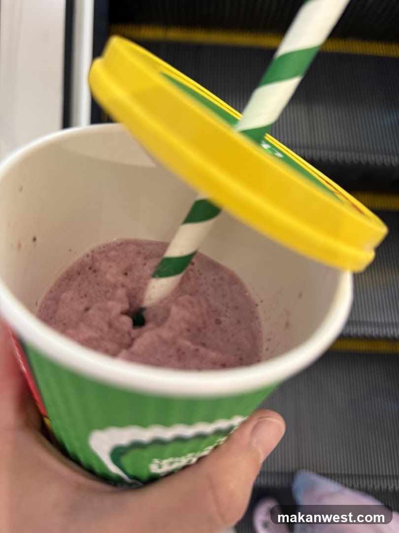 Frozen yogurt cup with straw