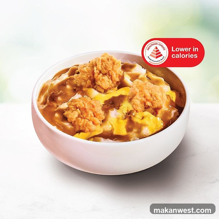 Bowl of Fried Chicken with Gravy and Cheese Sauce