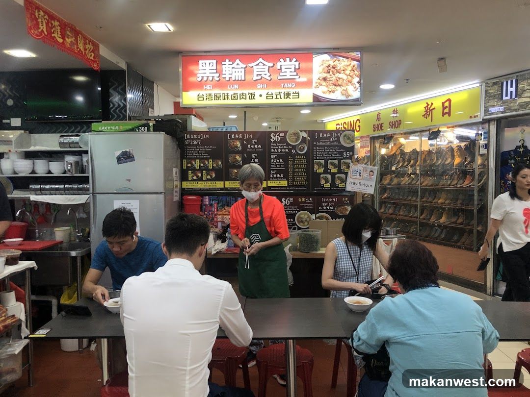Food stall interior with customers dining