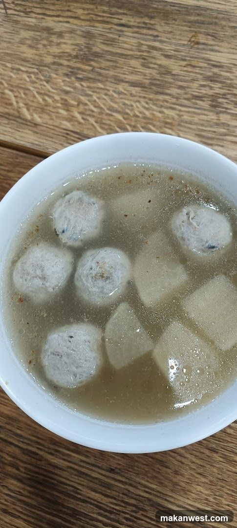 Bowl of Meatball Soup with Radish