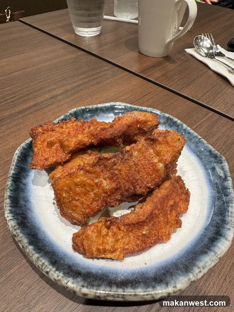 Fried Fish Fillets on a Plate