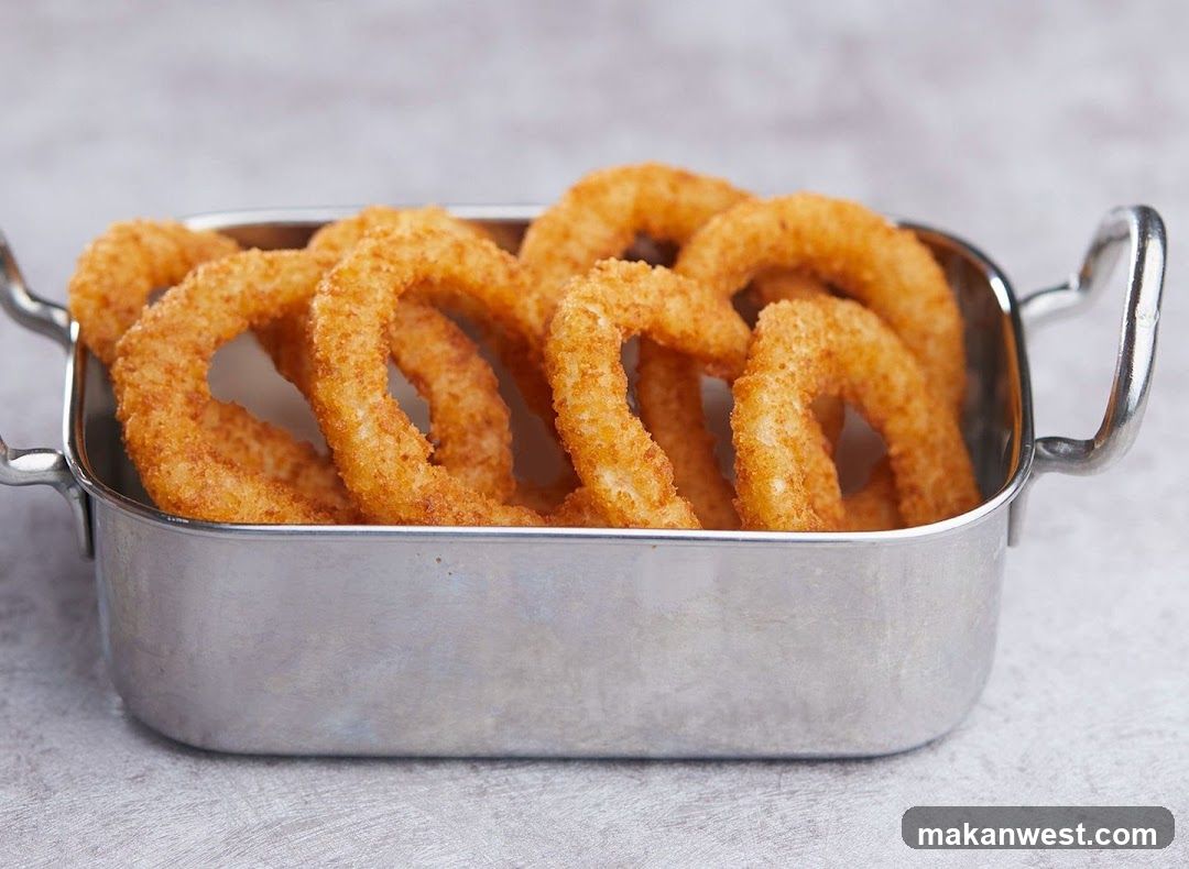 Fried Onion Rings in Metal Dish