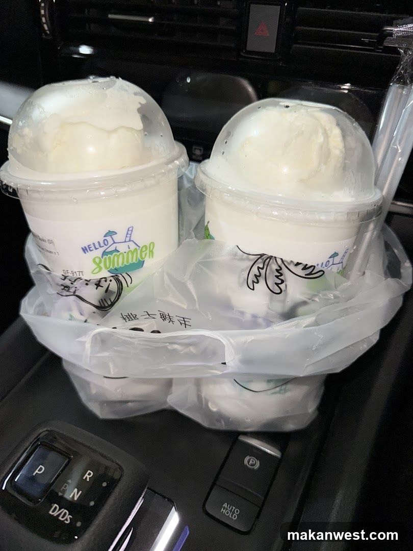 Two ice cream drinks in a car