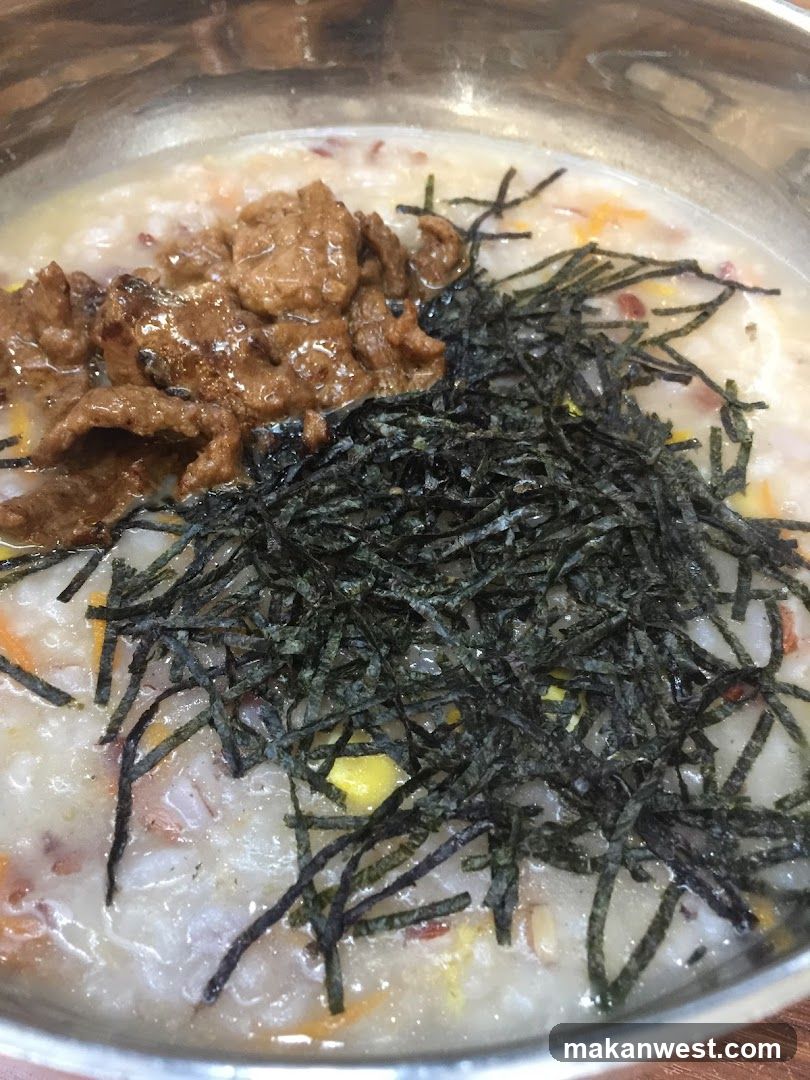 Bowl of Congee with Toppings