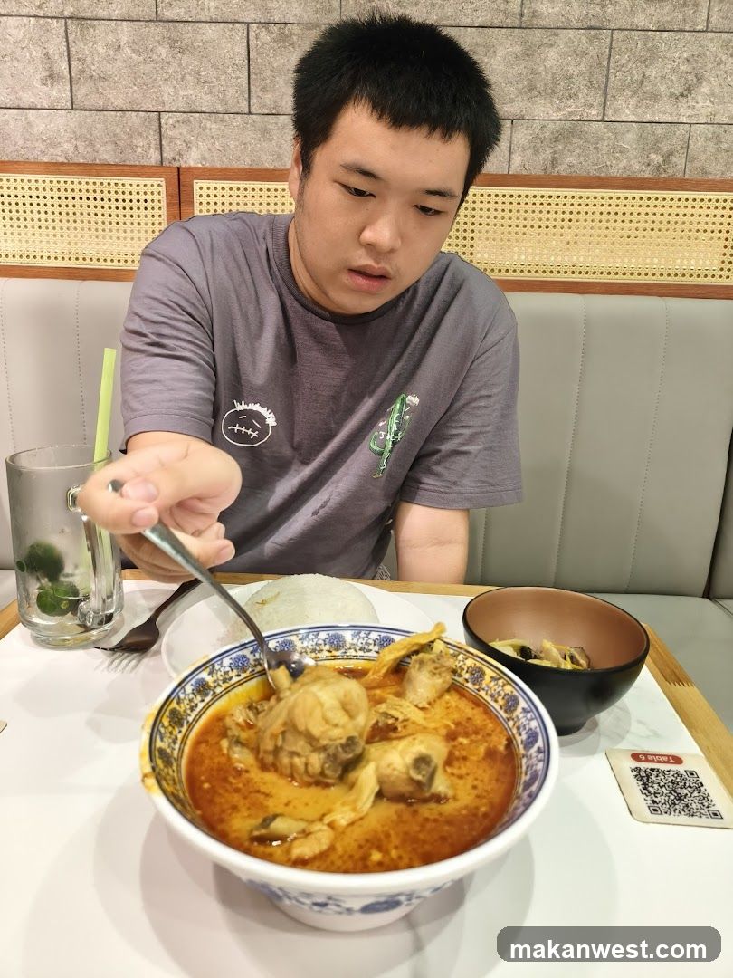 Person eating curry