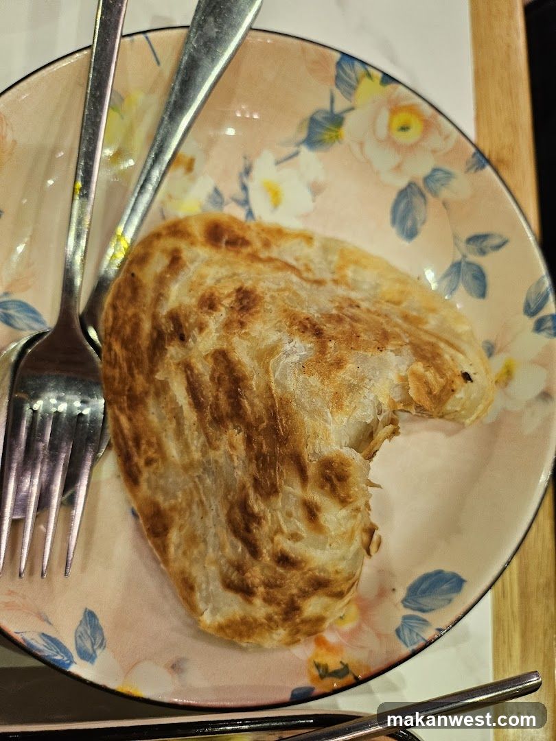 Roti Canai on a Floral Plate