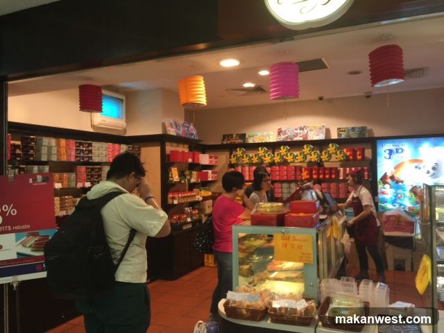 Bakery interior with customers and staff