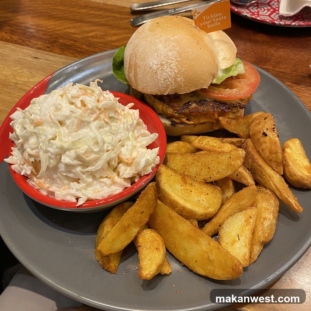 Burger with Coleslaw and Potato Wedges