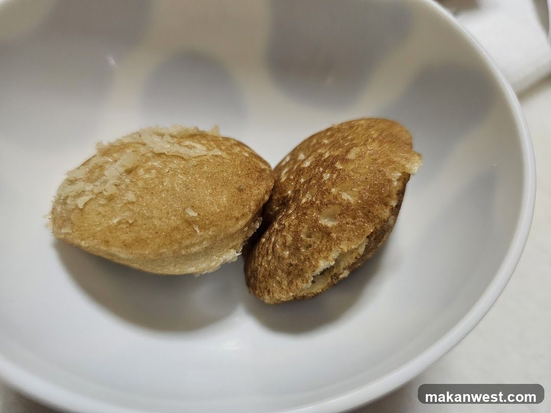 Two small pancakes in a white bowl