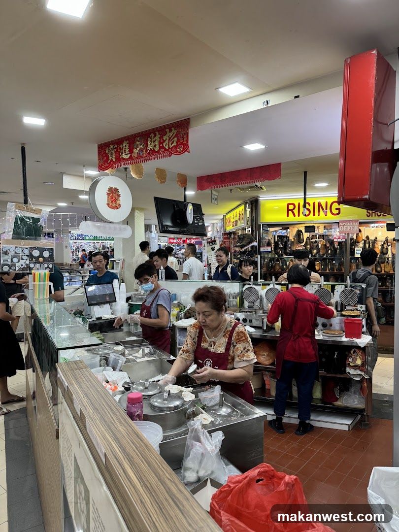 Food Stall with Staff Preparing Food