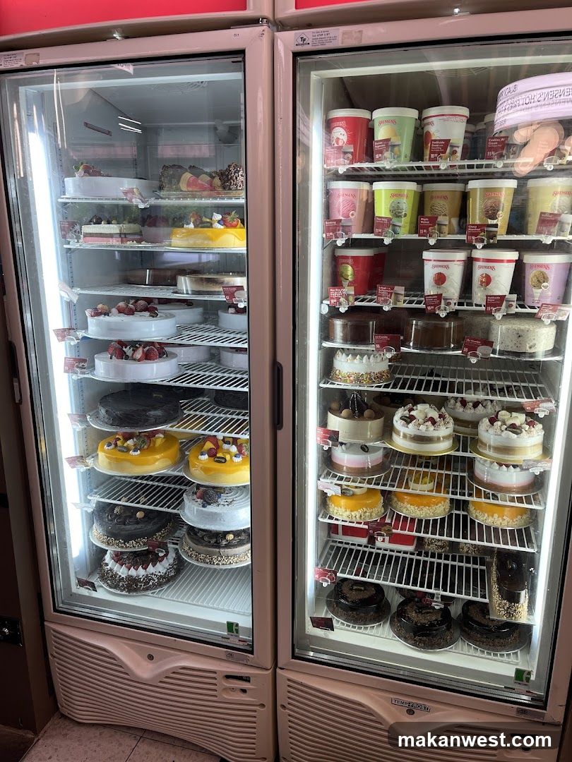 Refrigerated Display Cases with Cakes and Ice Cream