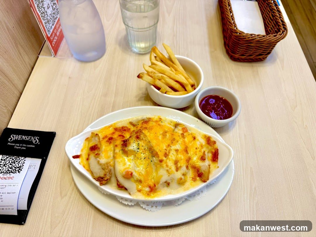 Baked Dish with Fries and Ketchup