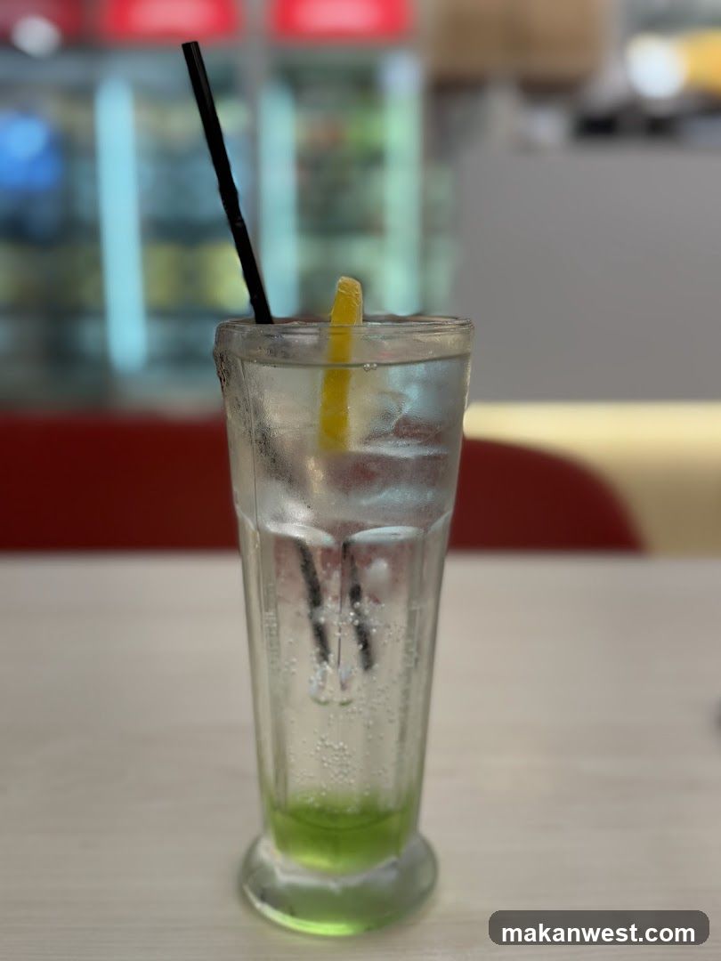 Glass of Green Drink with Lemon