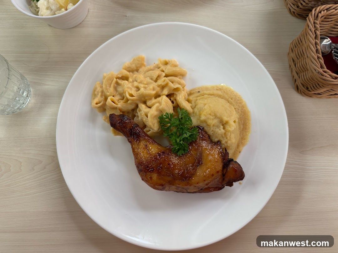 Roasted Chicken Leg with Macaroni and Cheese and Mashed Potatoes