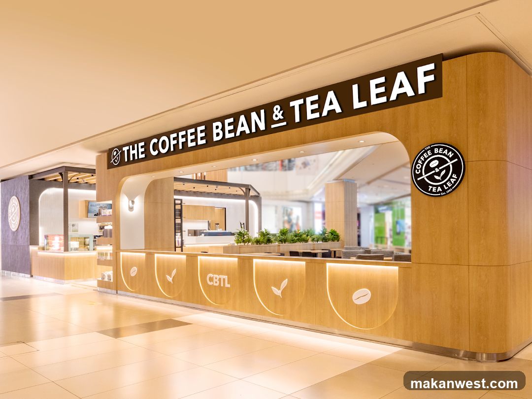 A modern coffee and tea shop with a light wood exterior and a large illuminated sign. The shop features a counter with seating areas and decorative plants. A circular logo is visible on the side of the shop.