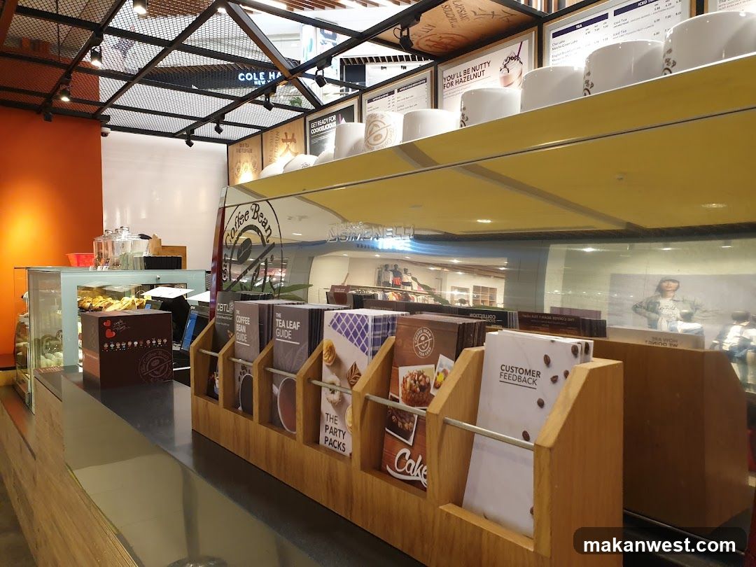 Coffee shop counter with menu holders and espresso machine