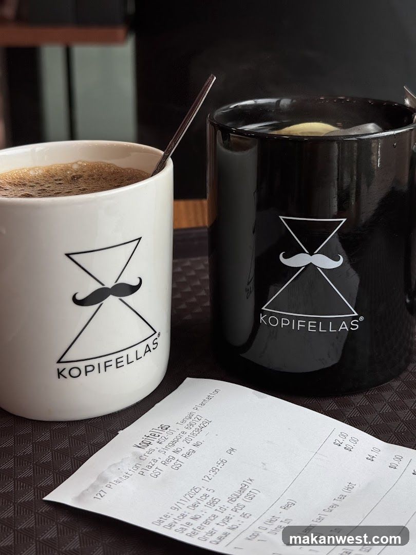 Two Mugs of Coffee and a Receipt