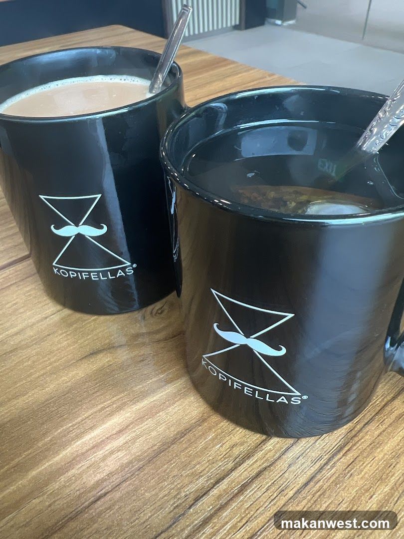 Two Mugs of Drinks