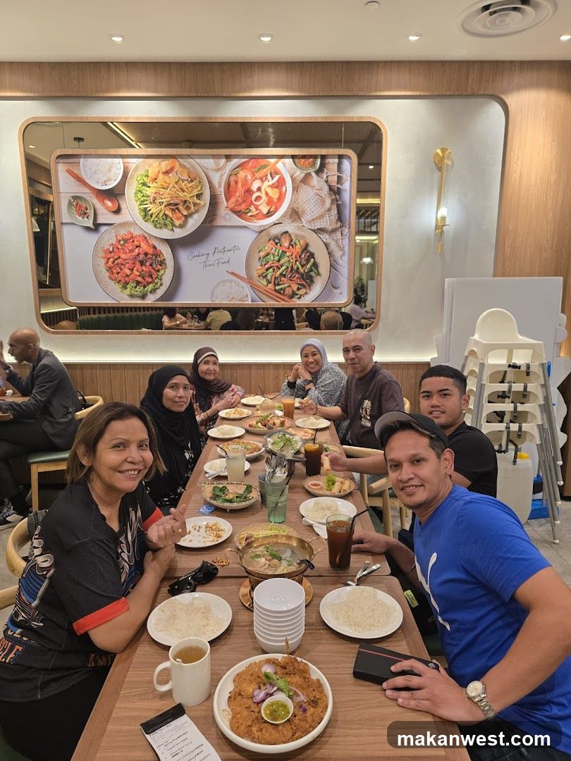 Family enjoying a meal at a Thai restaurant