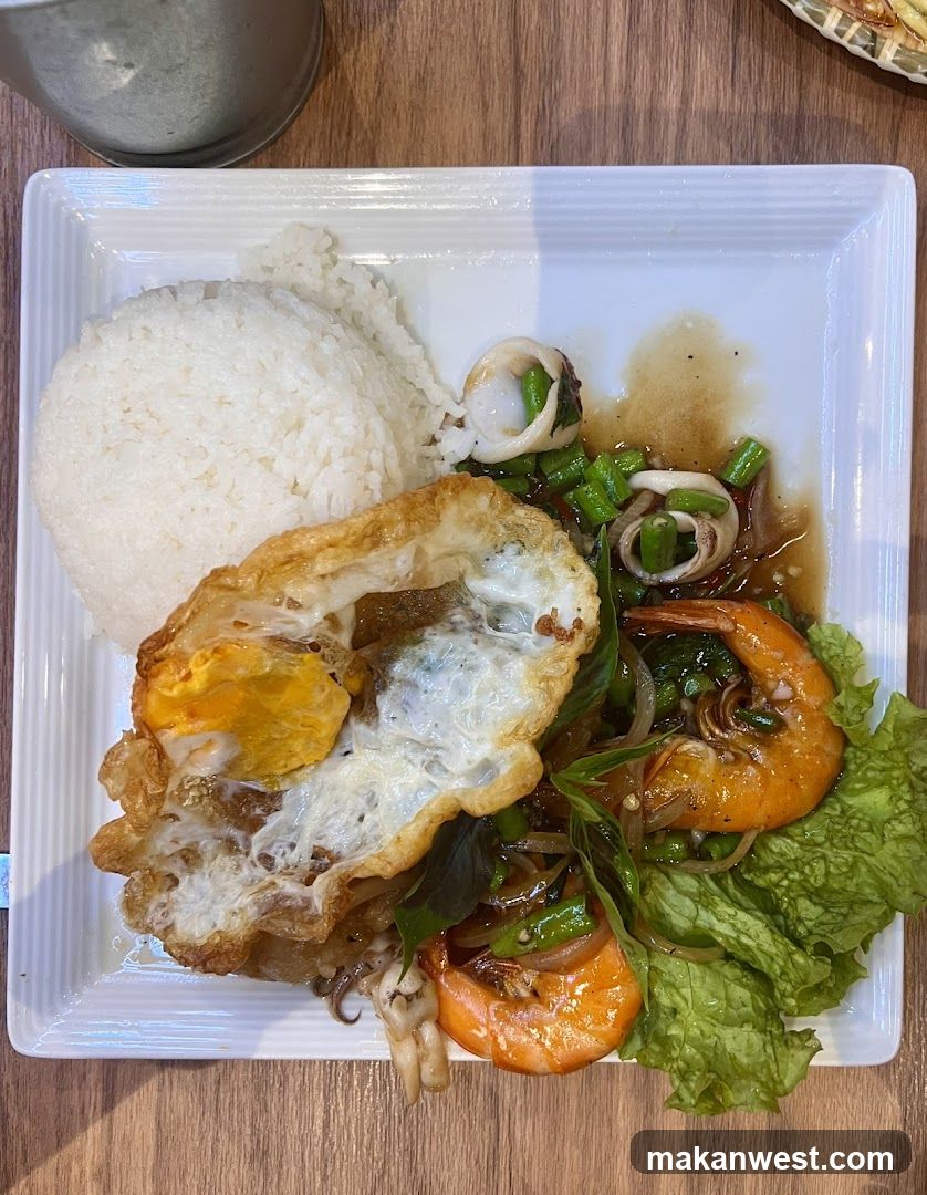 Seafood Stir-fry with Rice and Fried Egg