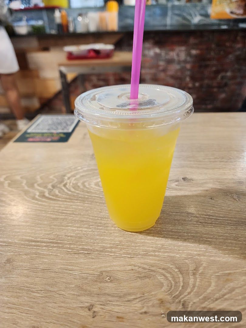 Yellow Drink with Pink Straw