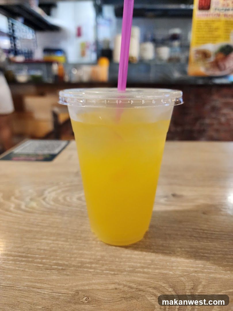 Yellow Drink with Purple Straw