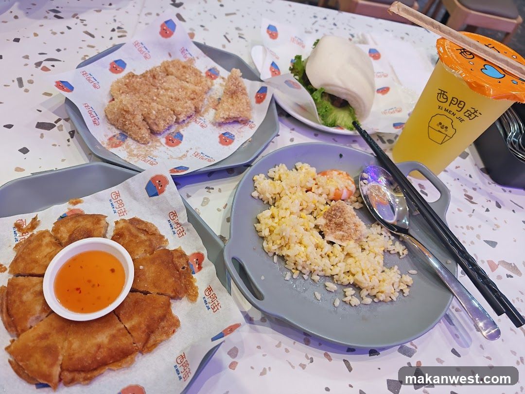Table with various dishes and a drink