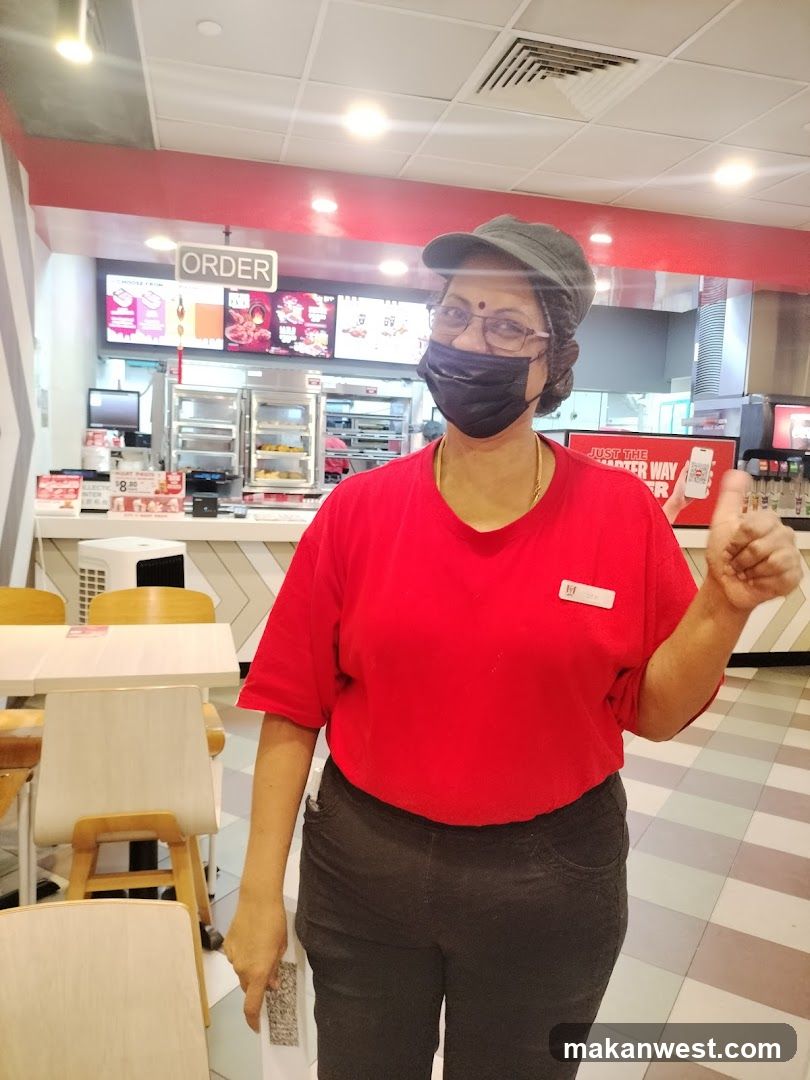 Employee giving a thumbs up
