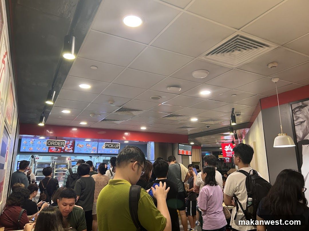 People queuing at a fast-food restaurant