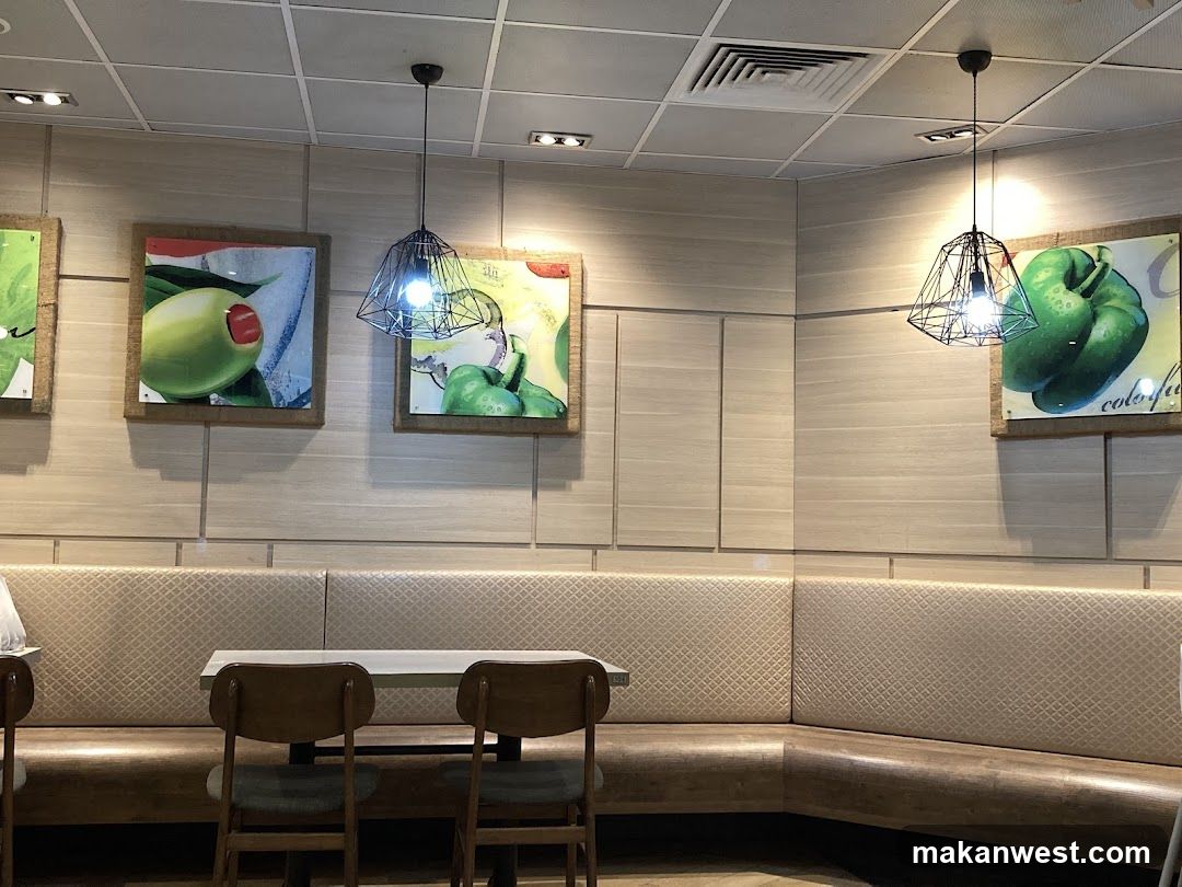 Restaurant Interior with Booth Seating and Artwork