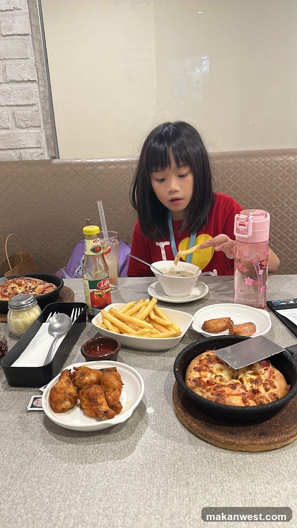 Girl eating at a restaurant