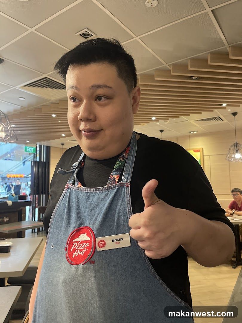Pizza Hut Employee Giving Thumbs Up
