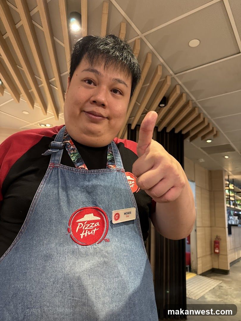 Employee giving a thumbs up