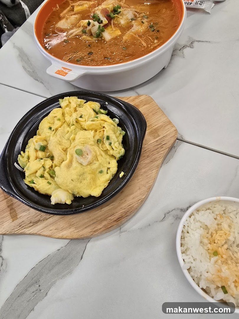 Meal with Scrambled Eggs and Soup