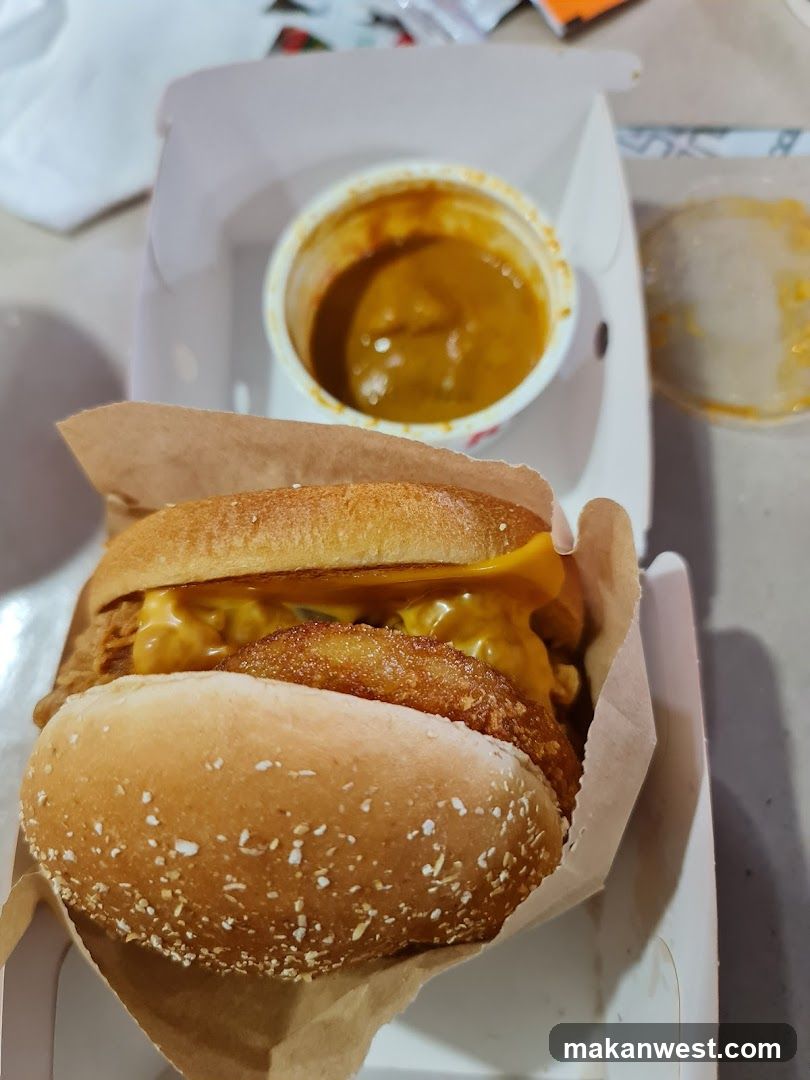 Cheeseburger with a side of sauce