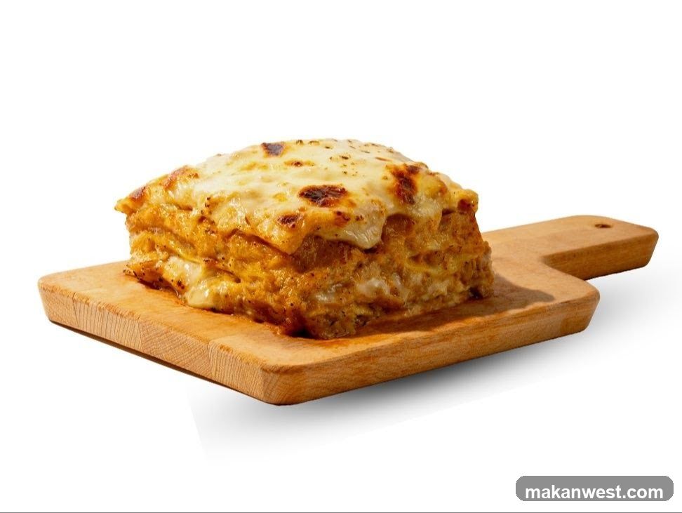 Lasagna Slice on Wooden Board