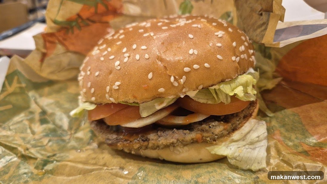 Burger with Lettuce, Tomato, and Onion