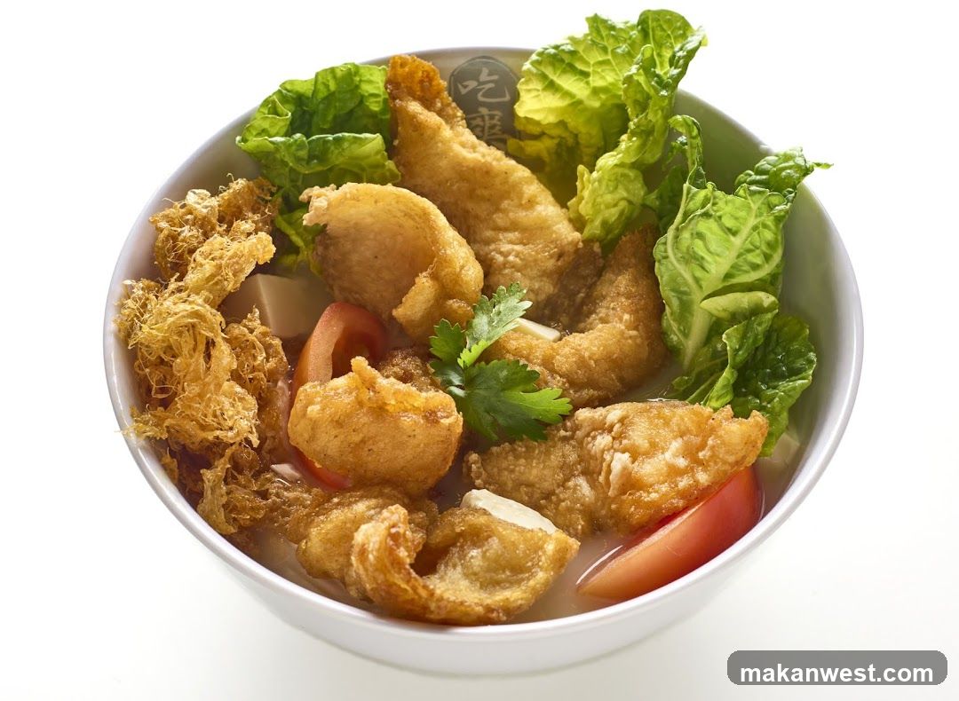 Bowl of Fried Fish and Vegetables