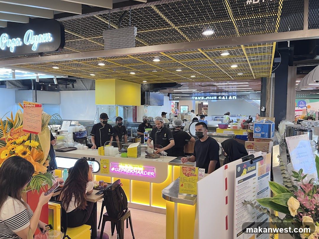 Food Stall with Staff and Customers