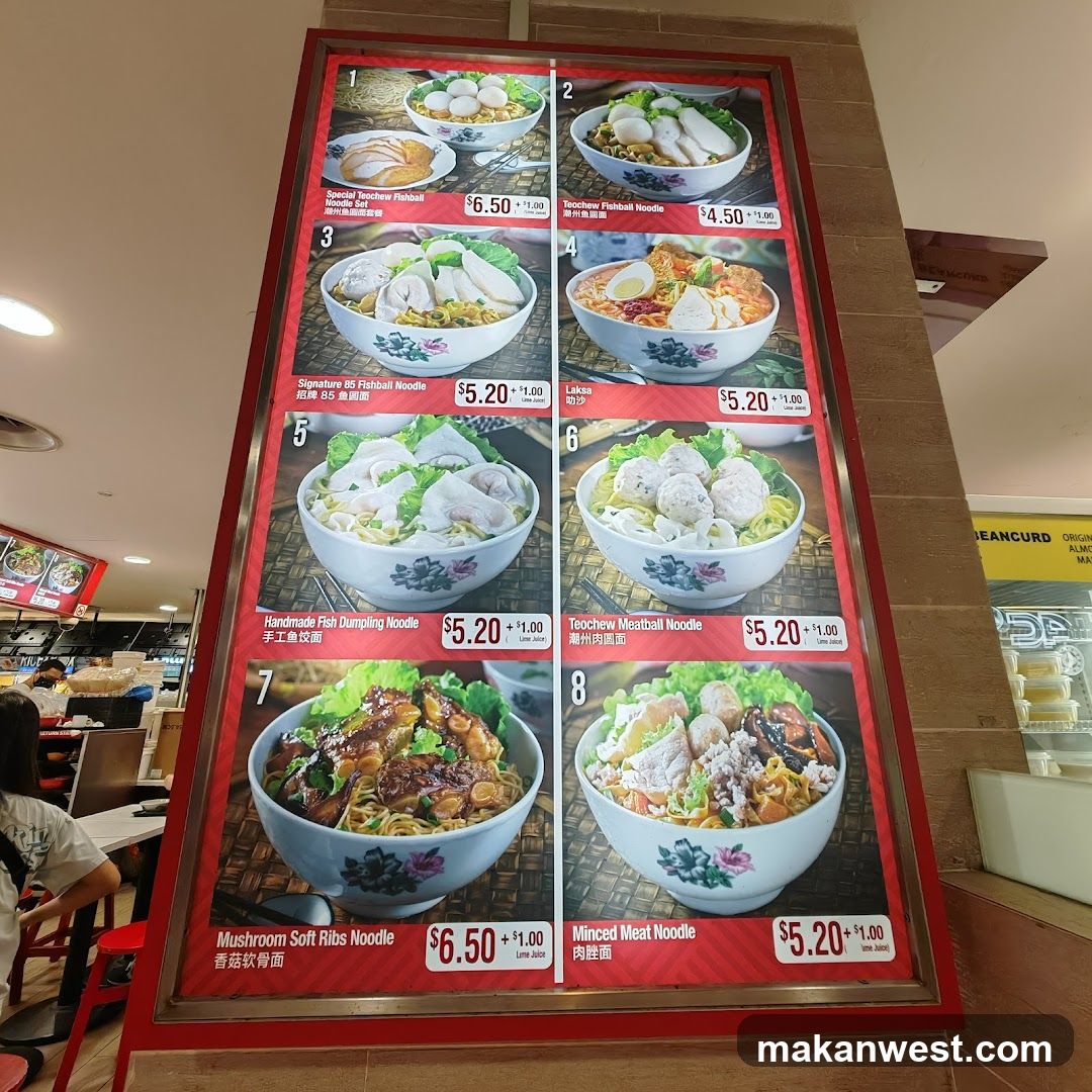 A menu board displaying various noodle dishes with images and prices.