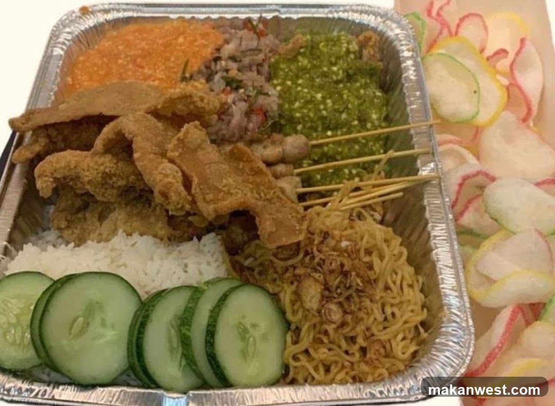 Meal Tray with Fried Chicken, Rice, Noodles, and Condiments